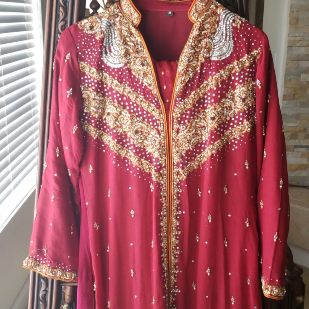 Gorgeous suit with gold embroidery